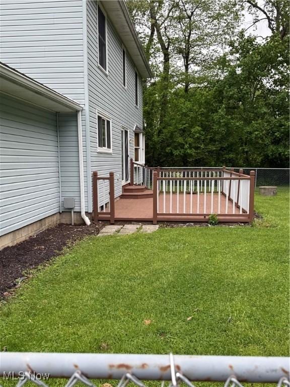 view of yard with a deck