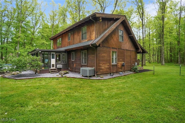 1354 N Pricetown Rd, Diamond, OH 44412 - rear view of house with a sunroom and a yard