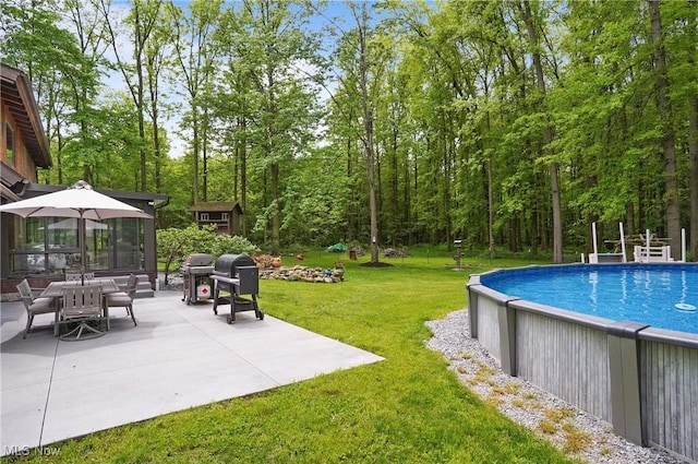 1354 N Pricetown Rd, Diamond, OH 44412 - outdoor pool with a patio area, grilling area, a storage unit, and an outdoor structure
