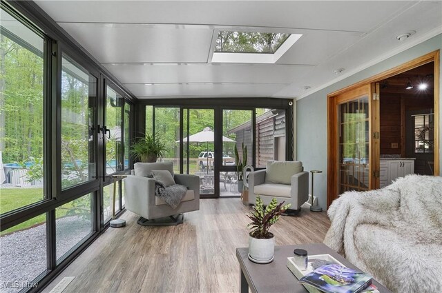 1354 N Pricetown Rd, Diamond, OH 44412 - sunroom / solarium featuring a skylight, wood finished floors, french doors, and floor to ceiling windows