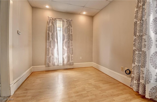 601 Short St, Dover, OH 44622 - unfurnished room featuring baseboards, wood finished floors, a paneled ceiling, and recessed lighting