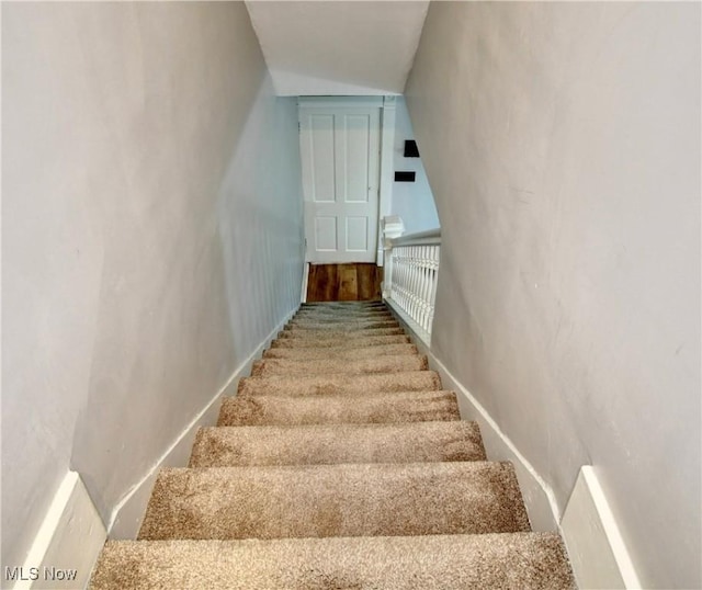 601 Short St, Dover, OH 44622 - stairway featuring carpet