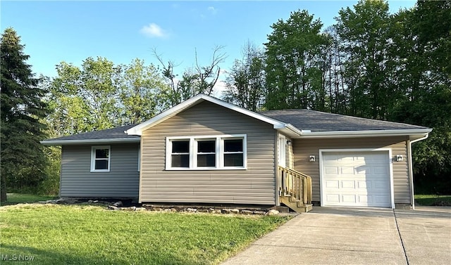 4378 Victoria Ter SE, Warren, OH 44484 - ranch-style home with an attached garage, concrete driveway, a front yard, and entry steps