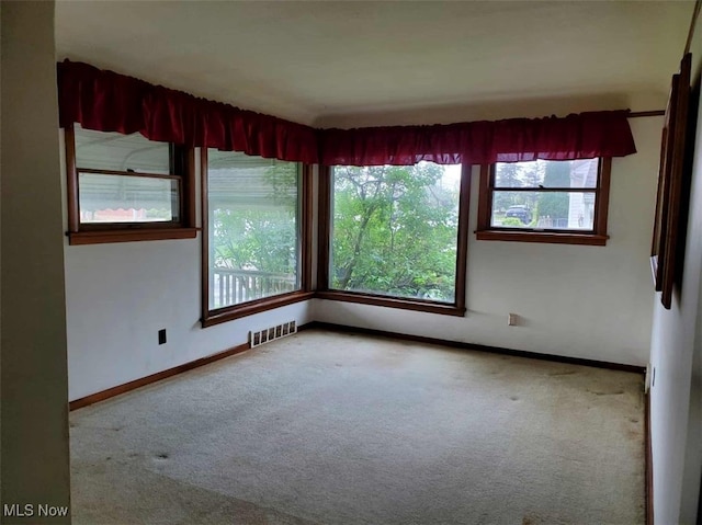 7417 Broadview Rd, Seven Hills, OH 44131 - spare room featuring carpet and baseboards