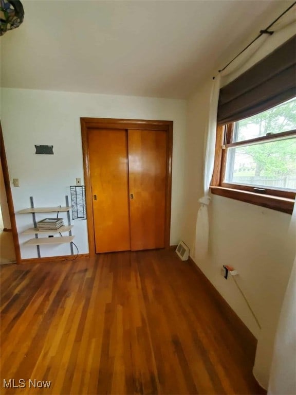 7417 Broadview Rd, Seven Hills, OH 44131 - unfurnished bedroom featuring wood finished floors and a closet