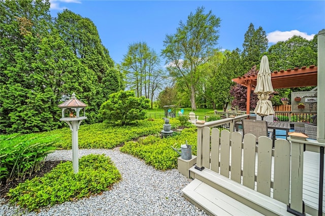 view of yard featuring a wooden deck