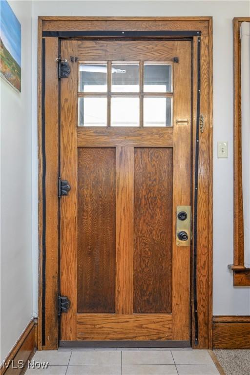 2534 6th St, Cuyahoga Falls, OH 44221 - doorway to outside with tile patterned floors