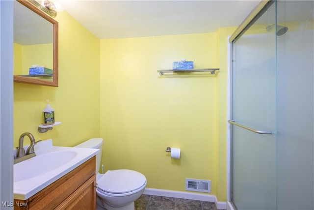 2534 6th St, Cuyahoga Falls, OH 44221 - bathroom featuring a shower stall, vanity, toilet, and baseboards