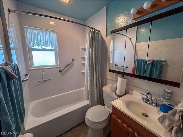 bathroom featuring decorative backsplash, vanity, shower / bath combination with curtain, and toilet