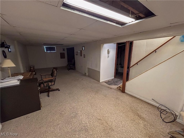 finished below grade area featuring carpet flooring