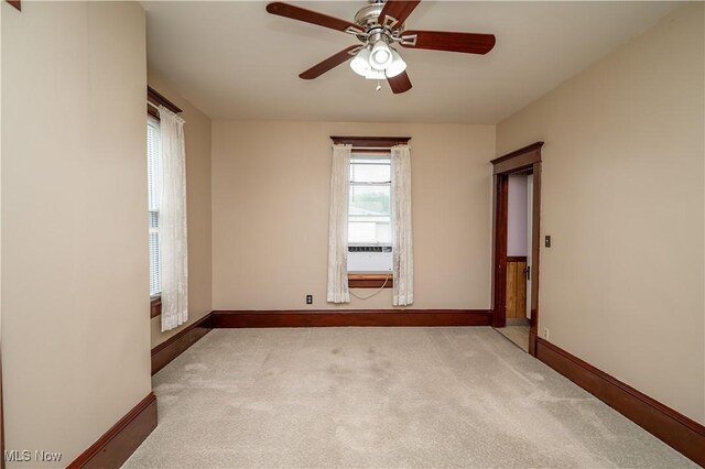 390 E Clark St, East Palestine, OH 44413 - carpeted spare room with ceiling fan and baseboards