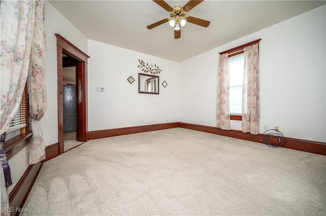 390 E Clark St, East Palestine, OH 44413 - carpeted empty room with ceiling fan and baseboards