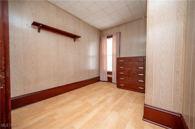 390 E Clark St, East Palestine, OH 44413 - unfurnished room featuring wood finished floors and wooden walls