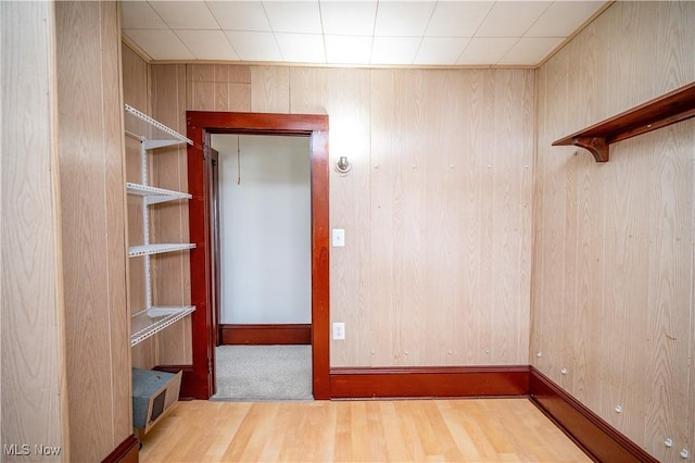 390 E Clark St, East Palestine, OH 44413 - spare room with wood finished floors and wooden walls