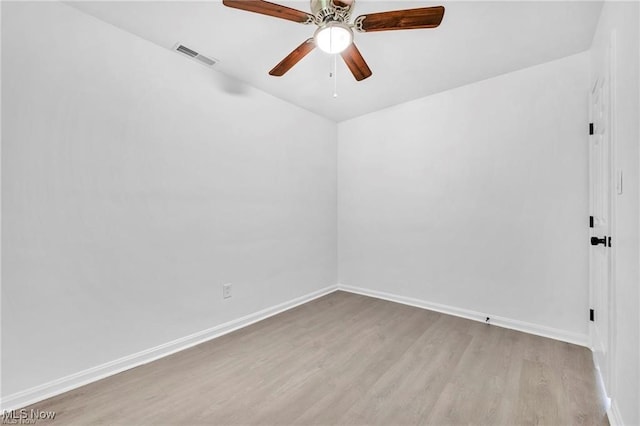 1212 Eastwood Ave, Mayfield Heights, OH 44124 - unfurnished room with wood finished floors, baseboards, and ceiling fan