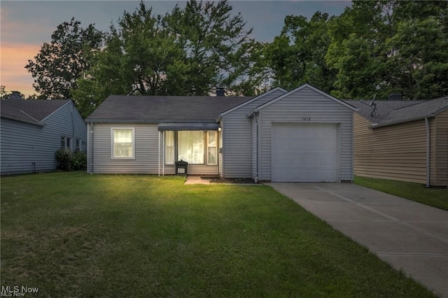 1212 Eastwood Ave, Mayfield Heights, OH 44124 - ranch-style house featuring an attached garage, driveway, and a lawn