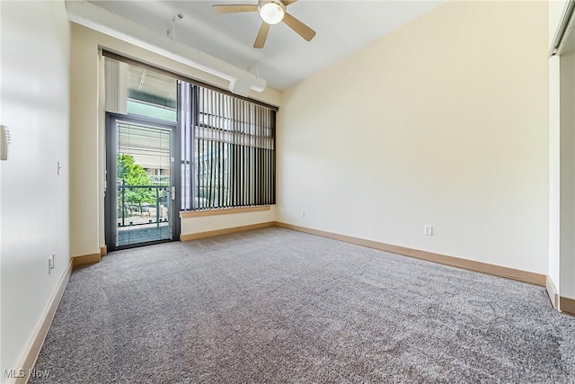 2030 Euclid Ave Unit 201, Cleveland, OH 44115 - empty room featuring carpet flooring, ceiling fan, and baseboards