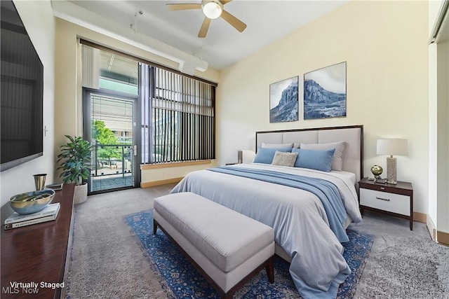 2030 Euclid Ave Unit 201, Cleveland, OH 44115 - bedroom with access to outside, wood finished floors, baseboards, and ceiling fan