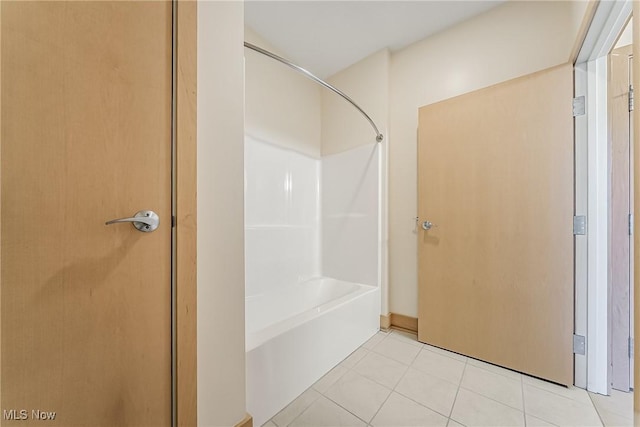 2030 Euclid Ave Unit 201, Cleveland, OH 44115 - bathroom featuring tile patterned floors and bathing tub / shower combination
