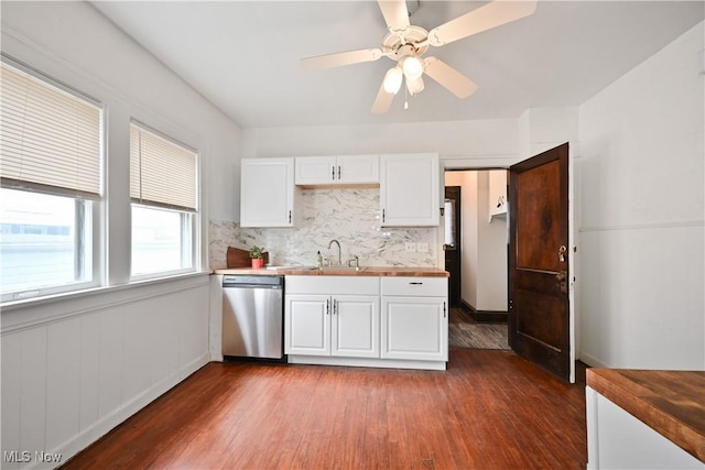 kitchen featuring dishwasher, dark wood-style flooring, white cabinets, and backsplash