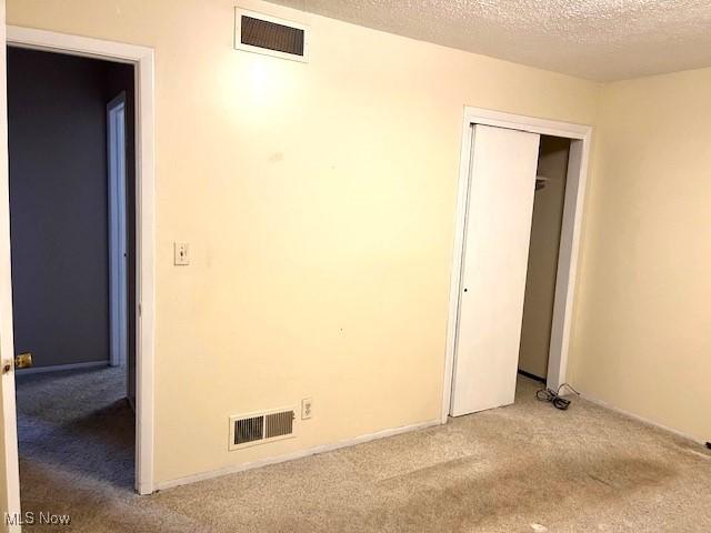 116 Brentwood Blvd, Wintersville, OH 43953 - unfurnished room with carpet and a textured ceiling