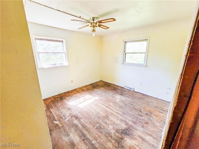 16251 State Route 678, Rockbridge, OH 43149 - unfurnished room featuring hardwood / wood-style flooring and a ceiling fan