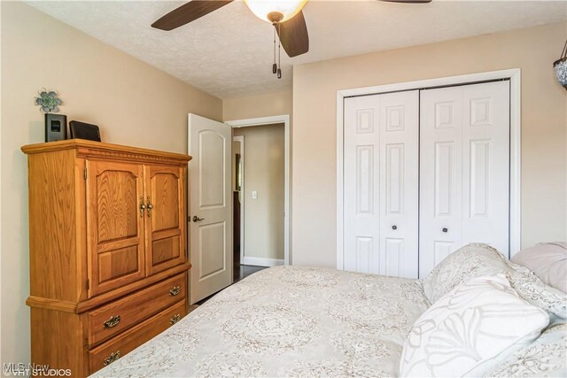37 Monticello Dr, Brunswick, OH 44212 - bedroom featuring a closet, a ceiling fan, and baseboards