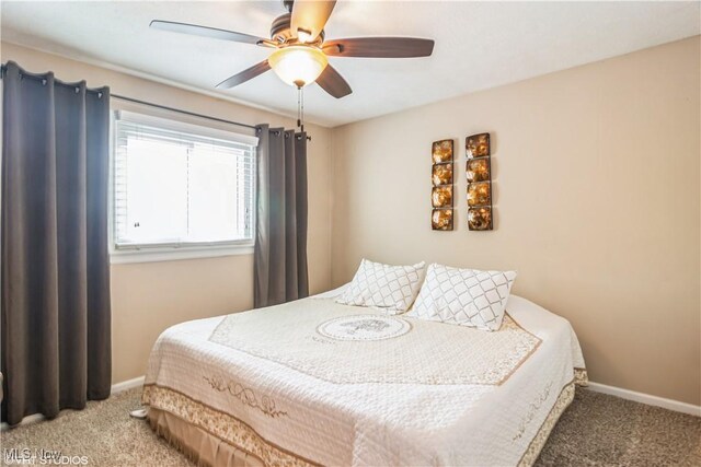 37 Monticello Dr, Brunswick, OH 44212 - bedroom featuring carpet flooring, baseboards, and a ceiling fan