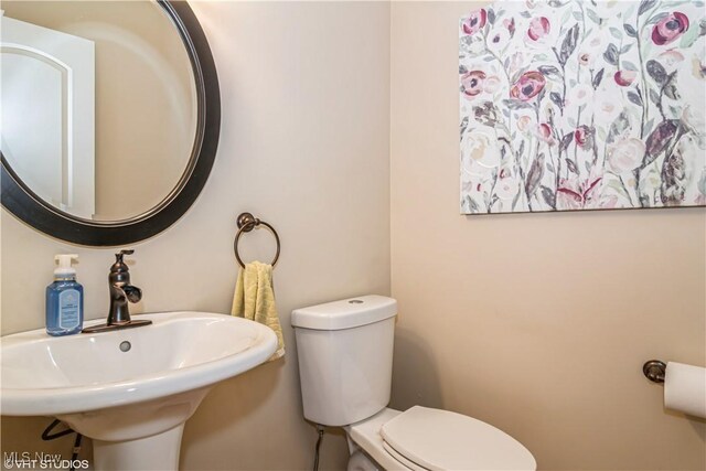 37 Monticello Dr, Brunswick, OH 44212 - bathroom featuring a sink and toilet
