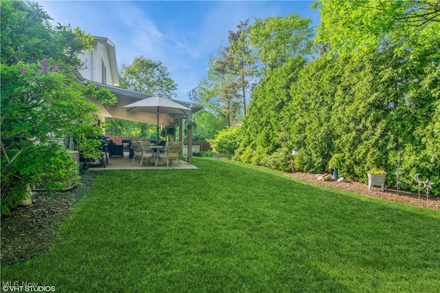 37 Monticello Dr, Brunswick, OH 44212 - view of green lawn with a patio