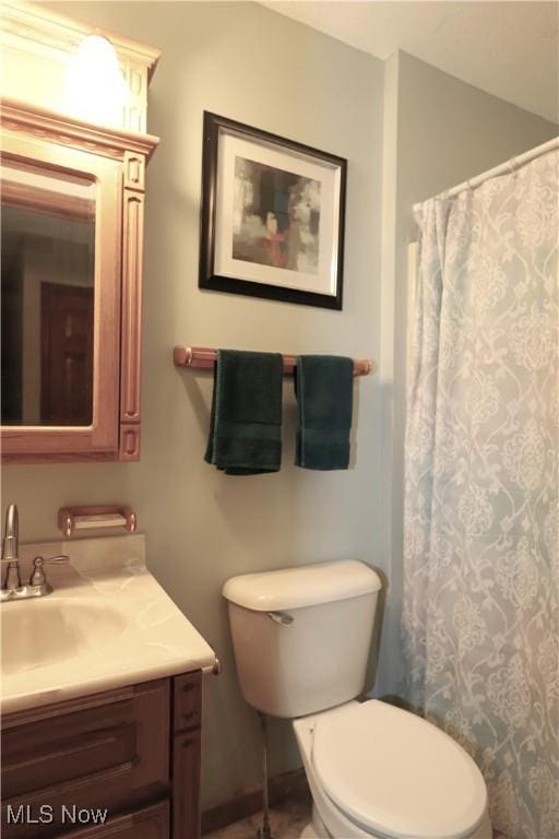 6191 Root Rd, Spencer, OH 44275 - bathroom featuring toilet, vanity, and a shower with shower curtain