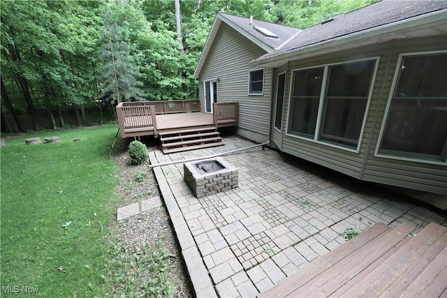 6191 Root Rd, Spencer, OH 44275 - view of patio / terrace featuring a fire pit and a deck