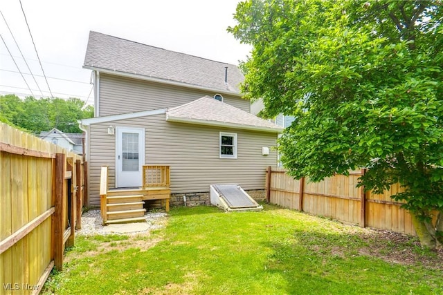 146 E Bergey St, Wadsworth, OH 44281 - rear view of property featuring roof with shingles