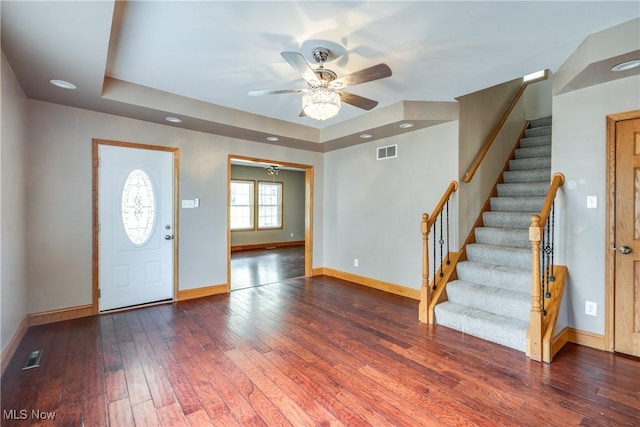 146 E Bergey St, Wadsworth, OH 44281 - foyer with baseboards, wood-type flooring, stairway, a ceiling fan, and a tray ceiling
