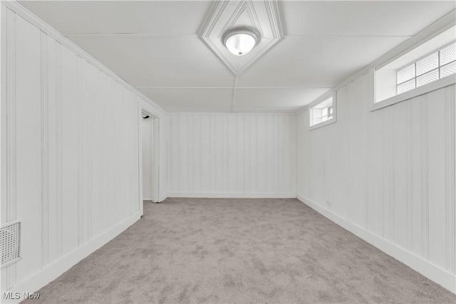 563 E 260th St, Euclid, OH 44132 - basement featuring carpet and a decorative wall