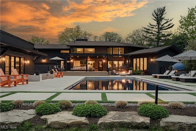 2471 Snowberry Ln, Pepper Pike, OH 44124 - rear view of property featuring a patio and an outdoor pool