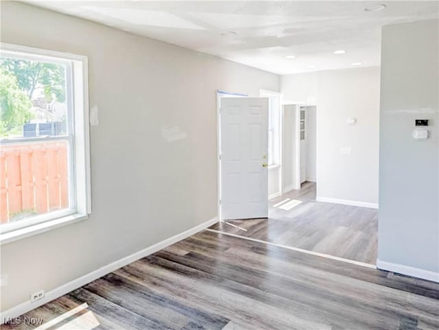 1292 W 67th St, Cleveland, OH 44102 - spare room featuring wood finished floors, baseboards, and recessed lighting