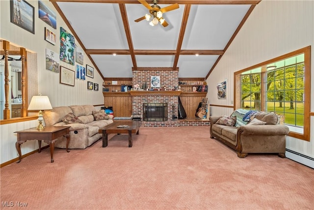 41972 Griswold Rd, Elyria, OH 44035 - living room featuring a ceiling fan, beamed ceiling, carpet floors, a brick fireplace, and wooden walls