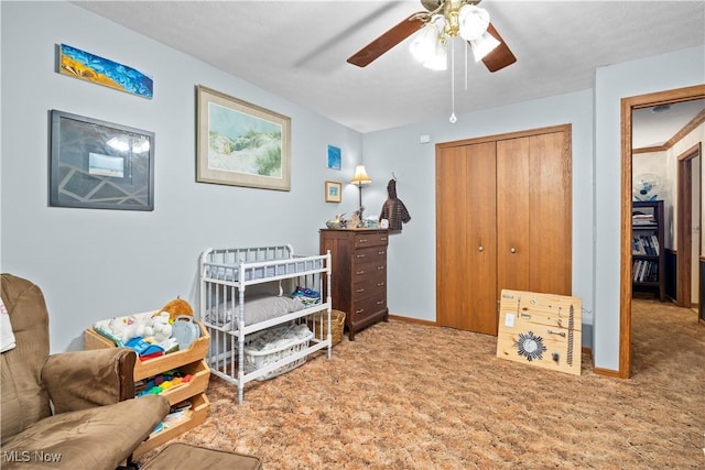 41972 Griswold Rd, Elyria, OH 44035 - carpeted bedroom featuring a closet, baseboards, and ceiling fan