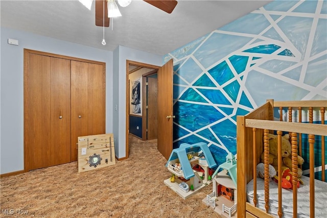 41972 Griswold Rd, Elyria, OH 44035 - bedroom with baseboards, ceiling fan, a closet, and carpet floors