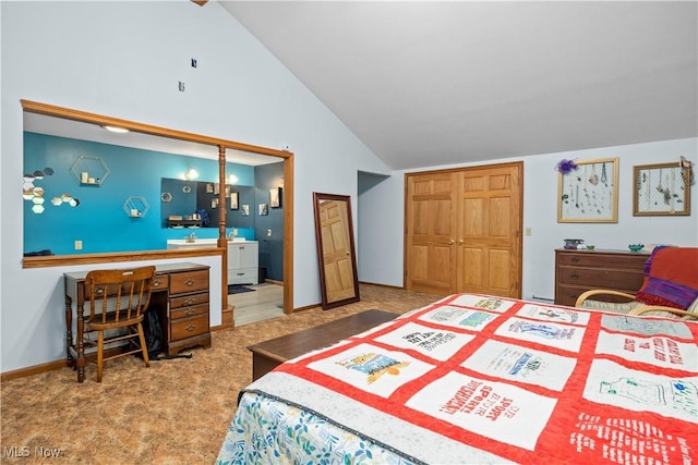 41972 Griswold Rd, Elyria, OH 44035 - bedroom with lofted ceiling, carpet floors, baseboards, and a closet