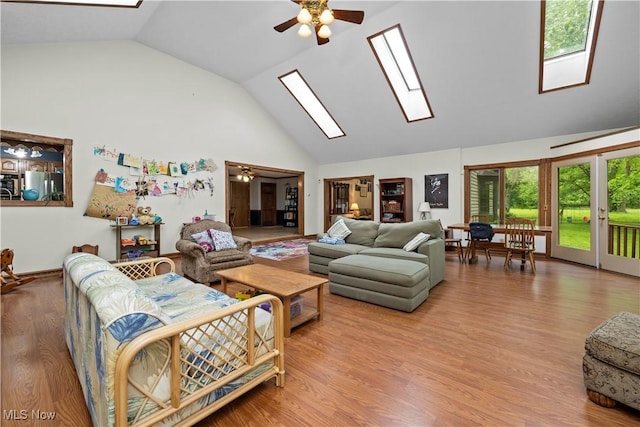 41972 Griswold Rd, Elyria, OH 44035 - living area with a skylight, a ceiling fan, high vaulted ceiling, and wood finished floors