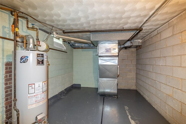 2639 Whiton Rd, University Heights, OH 44118 - unfinished basement with water heater and concrete block wall