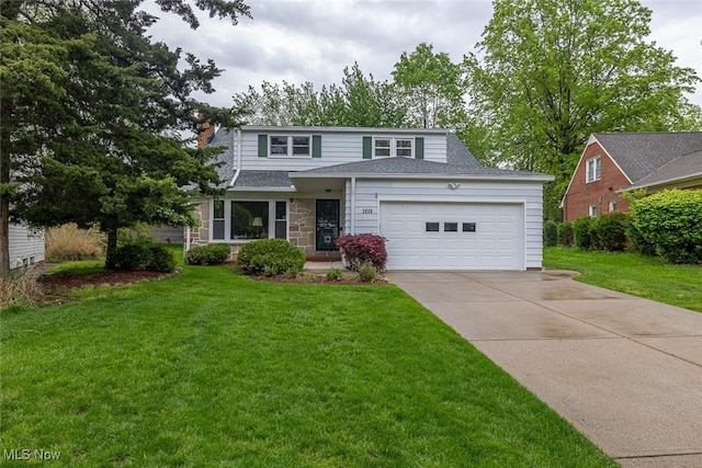 2639 Whiton Rd, University Heights, OH 44118 - traditional-style home with driveway, an attached garage, a front lawn, and a shingled roof