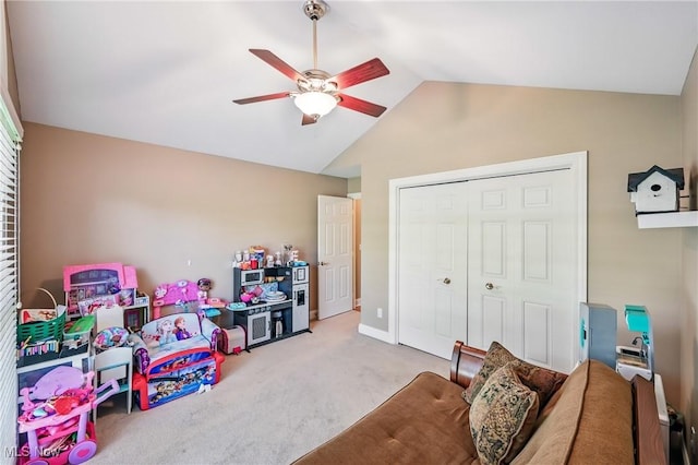 rec room featuring vaulted ceiling, ceiling fan, and carpet floors
