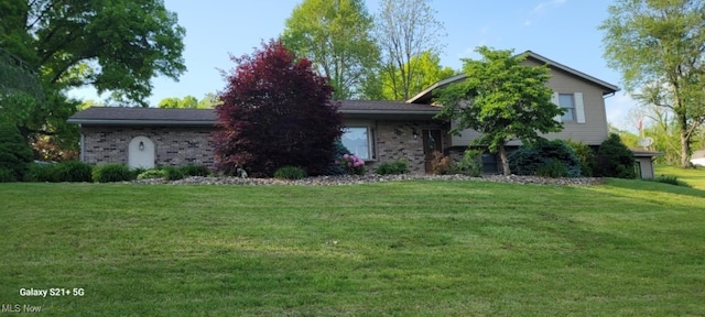 61426 Stillmeadow Ln, New Concord, OH 43762 - view of front of property with a front yard and brick siding