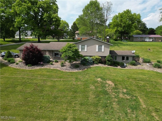 61426 Stillmeadow Ln, New Concord, OH 43762 - rear view of property with a yard