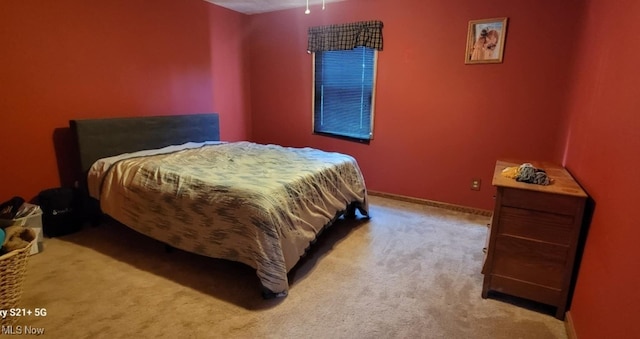 61426 Stillmeadow Ln, New Concord, OH 43762 - bedroom featuring carpet floors and baseboards