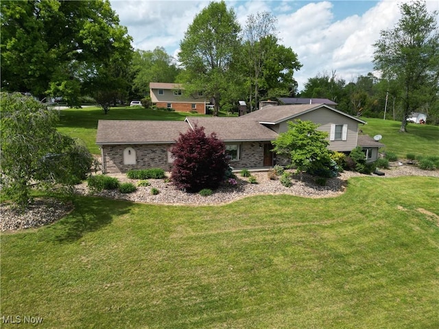 61426 Stillmeadow Ln, New Concord, OH 43762 - view of front of home featuring a front lawn and a chimney