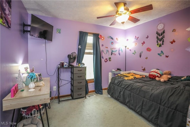 4217 State Route 82, Mantua, OH 44255 - bedroom with a textured ceiling, carpet floors, a ceiling fan, and baseboards